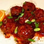 Slow Cooked Asian Meatballs on a platter with sauce and rice