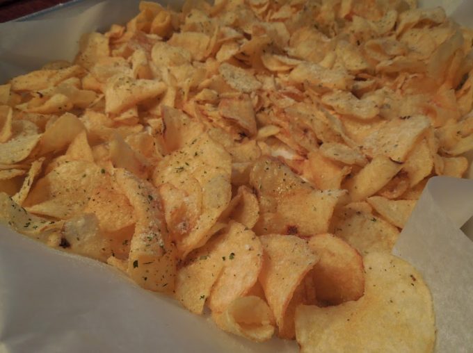 Italian And Cajun Gourmet Chips on a sheet pan
