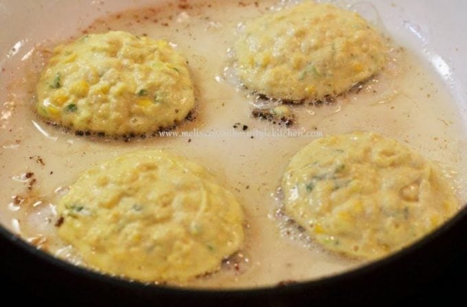 Frying corn cakes in a skillet