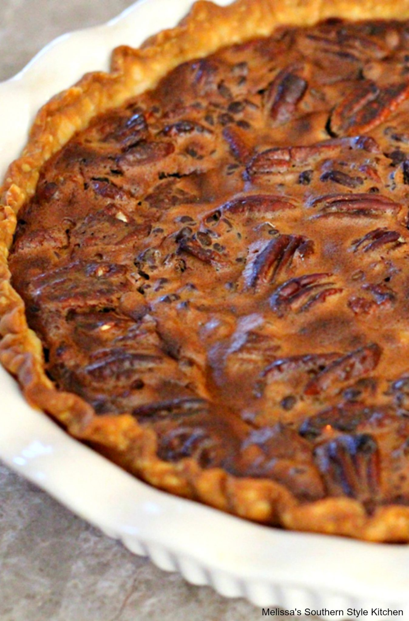 baked chocolate pecan pie in a dish