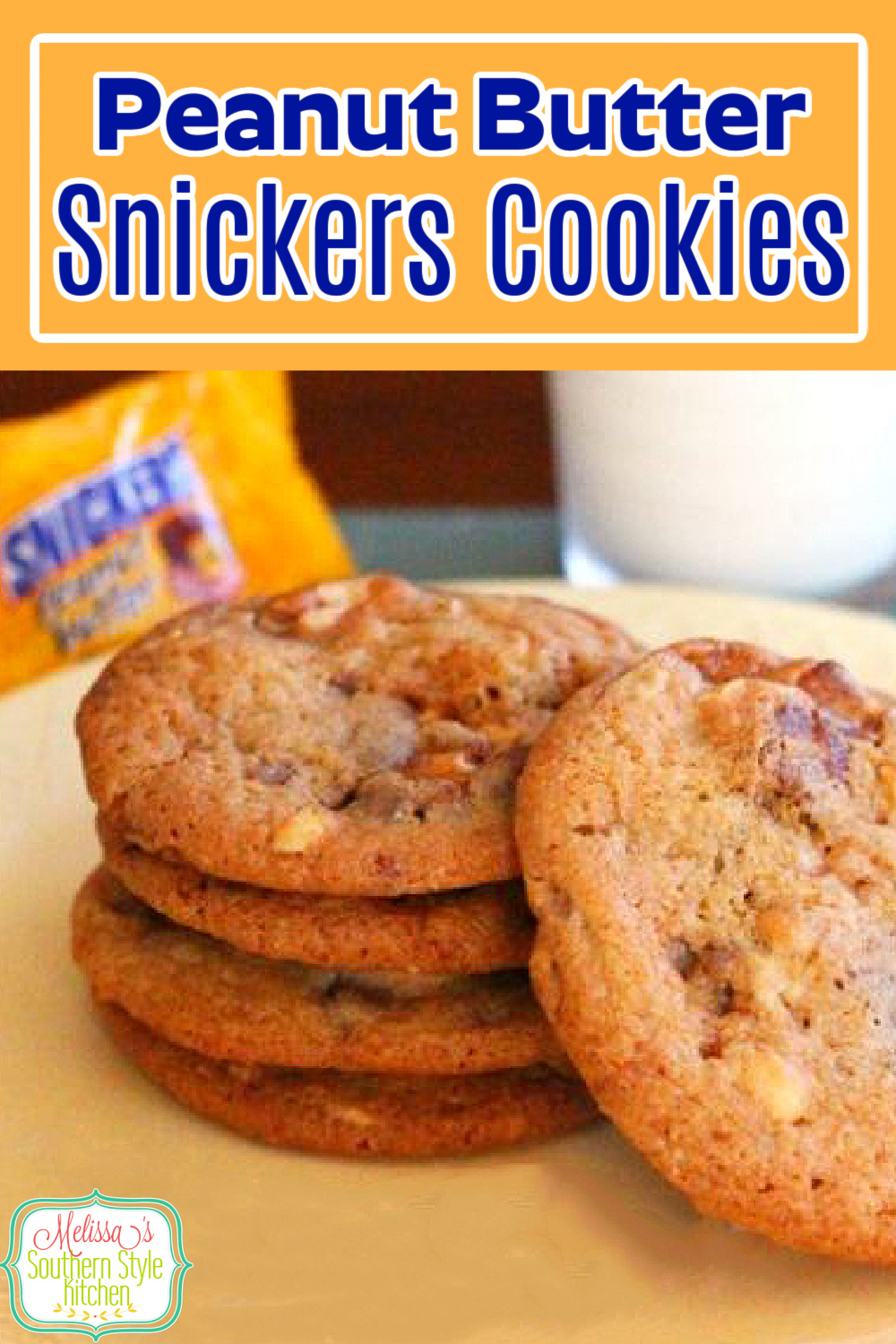 Snickers candy bars and peanut butter cookie dough collide in these Peanut Butter Snickers Cookies #candybars #candycookies #snickersbars #snickerscookies #holidaybaking #peanutbuttercookies