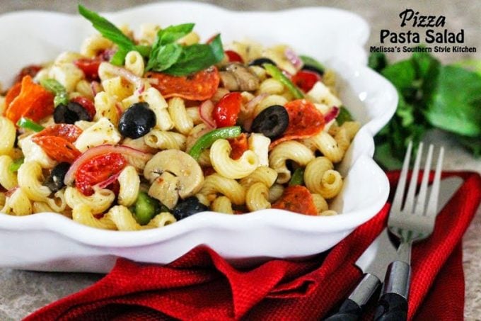Pizza Pasta Salad with a knife and fork in a bowl