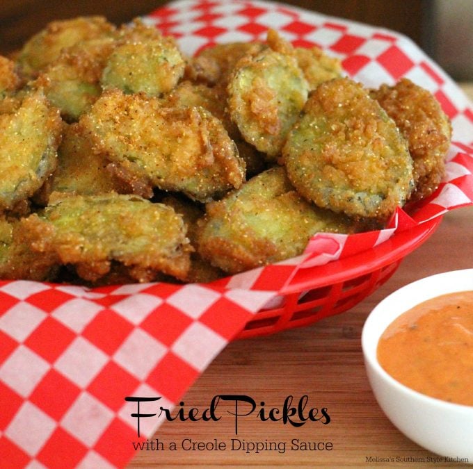 Fried Dill Pickles in a basket with dipping sauce