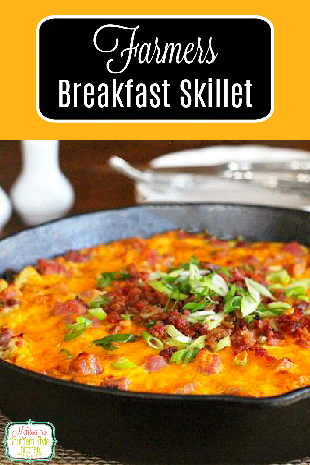 Start your morning with this cheesy skillet filled with ham, eggs and hash browns #farmersbreakfastskillet #eggs #baconandeggs #hahsbrowns #farmersbreakfast #brunchrecipes #breakfast #southernfood #southernrecipes #bacon #holidaybrunch #castironrecipes