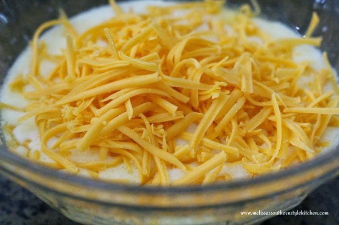 shredded cheese in a bowl with milk 