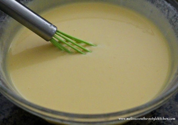 cheese sauce being whisked 