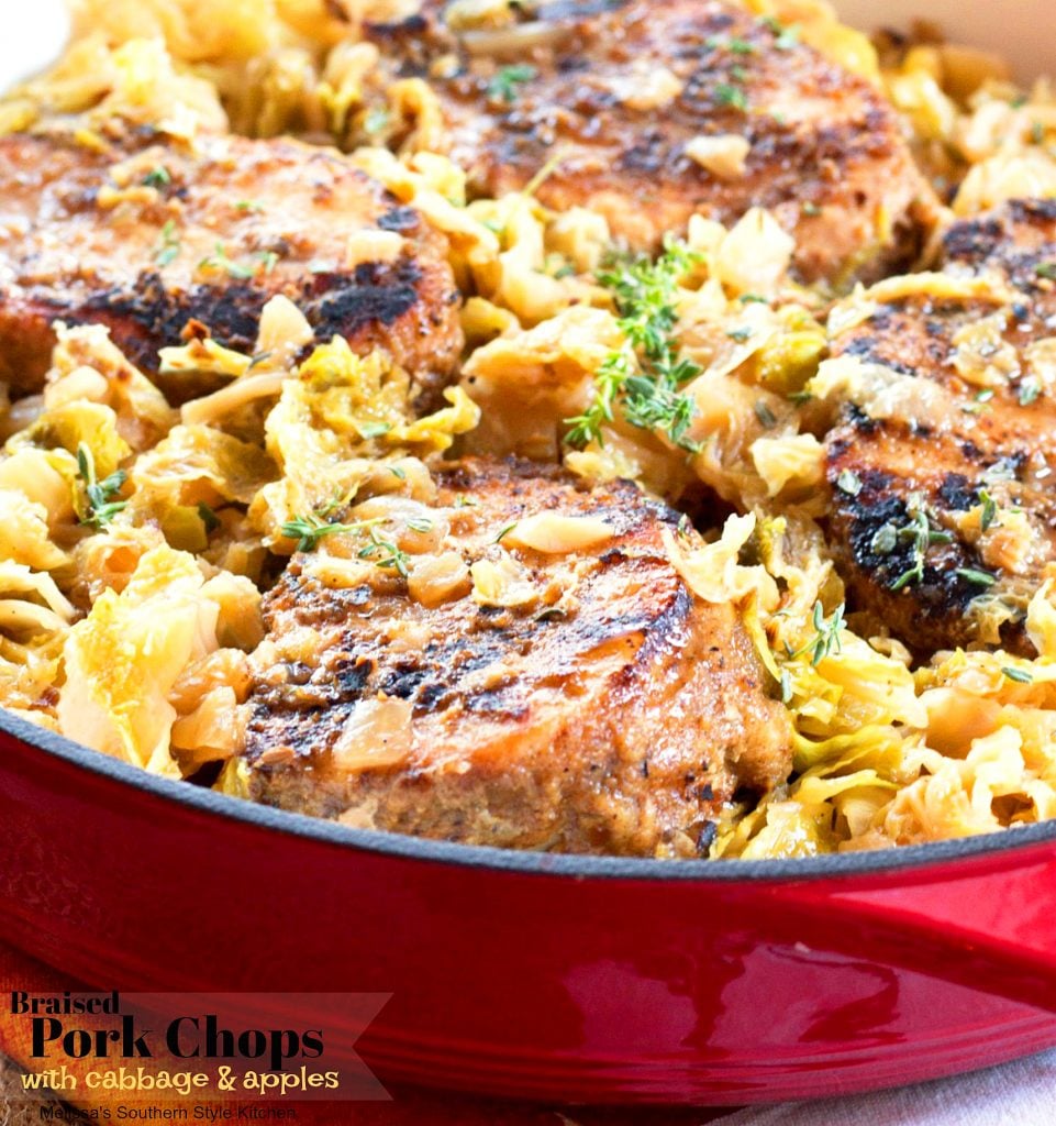 Braised Pork Chops with Cabbage and Apples in a skillet