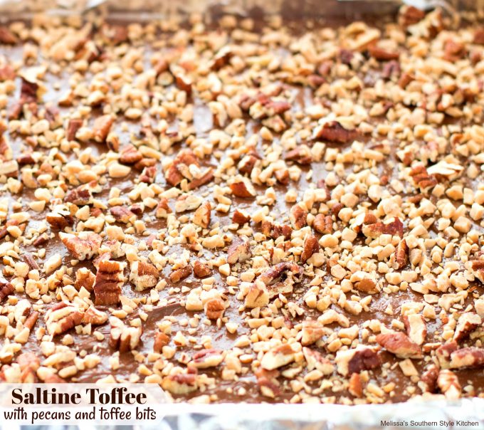 Saltine Toffee with Pecans and Toffee Bits on a pan