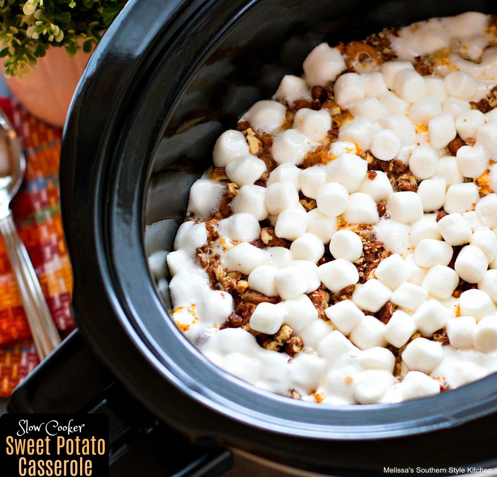 cooked sweet potato casserole with marshmallows and pecans