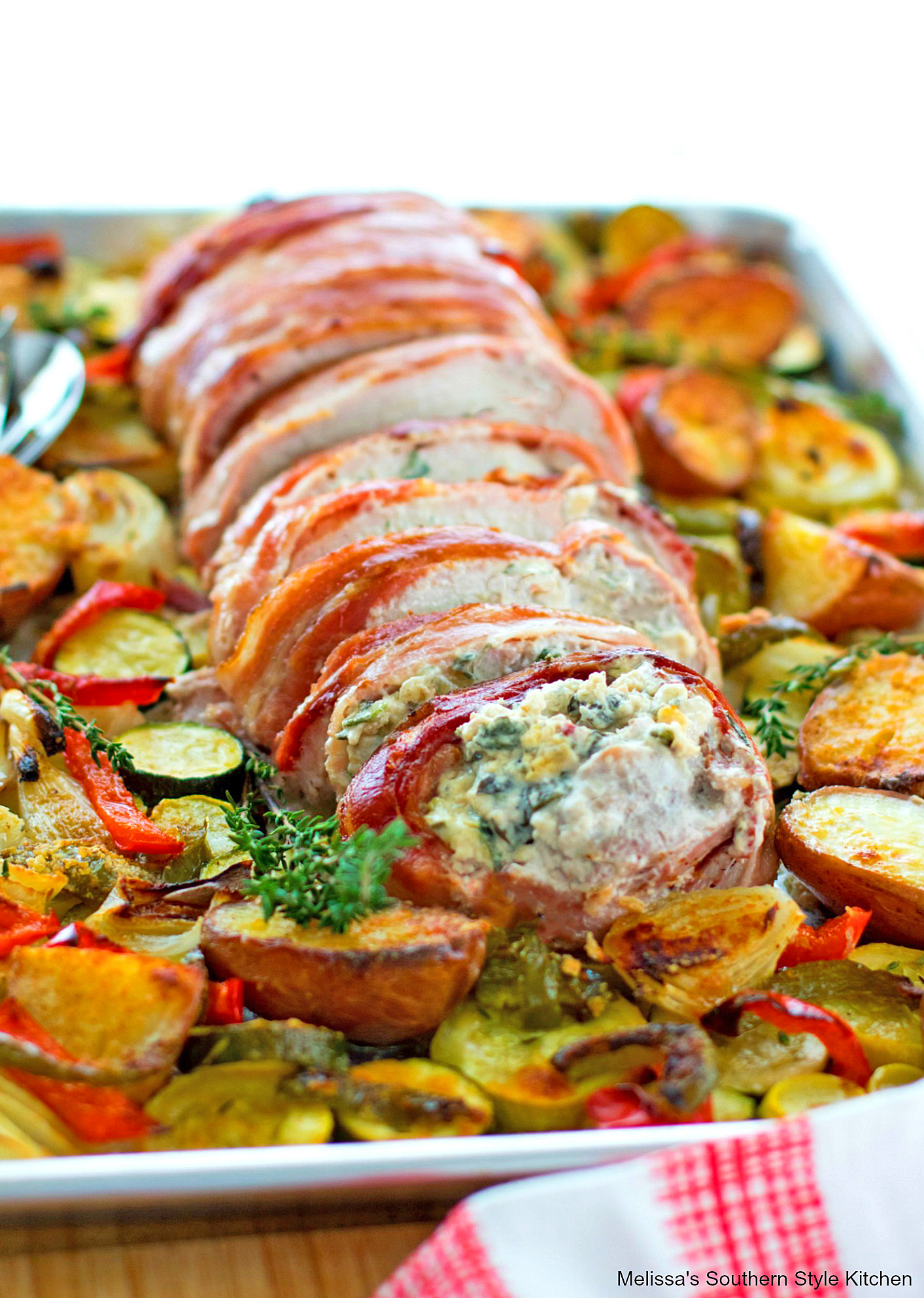 Bacon Wrapped Pork Loin with vegetables