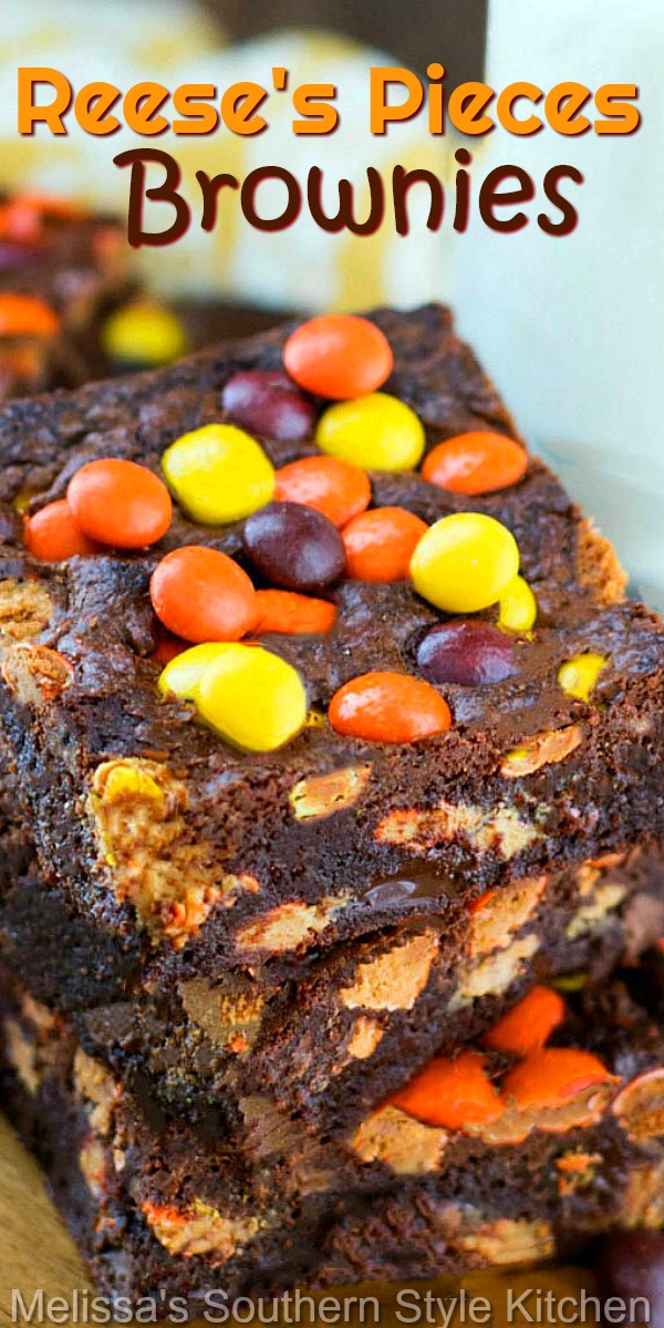 Fudgy Reese's Pieces Brownies are filled with chocolate chips, peanut butter cups and Reese's pieces, making these brownies hard to resist. #reesesbrownies #brownies #bestbrownies #peanutbutterbrownies #chocolate #chocolatebars #reesespieces #desserts #dessertfoodrecipes #holidaybaking #holidays #footballdesserts #peanutbutter #southernfood #southernrecipes #melissassoutherntylekitchen