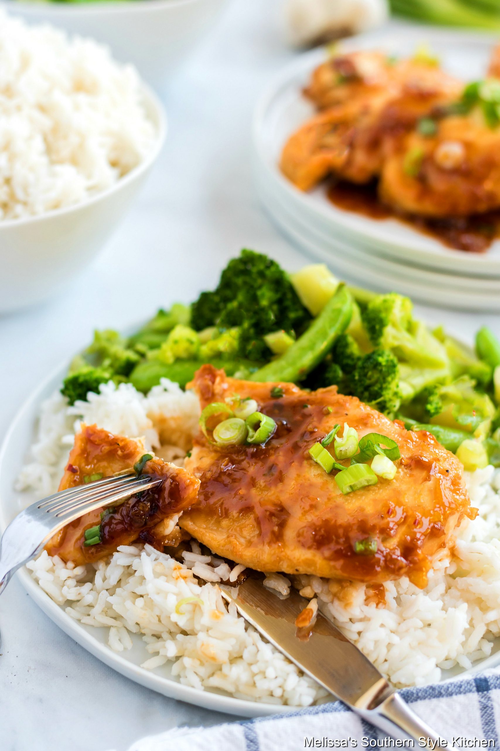 Garlic Brown Sugar Chicken on a plate with rice and broccoli
