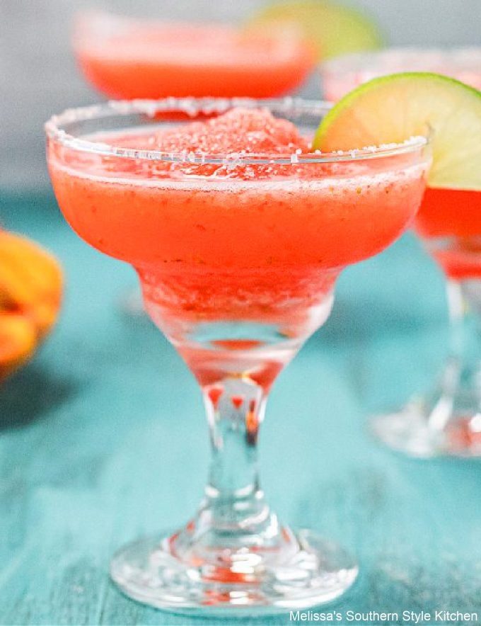 Frozen-Strawberry-Lime-Margaritas garnished with lime