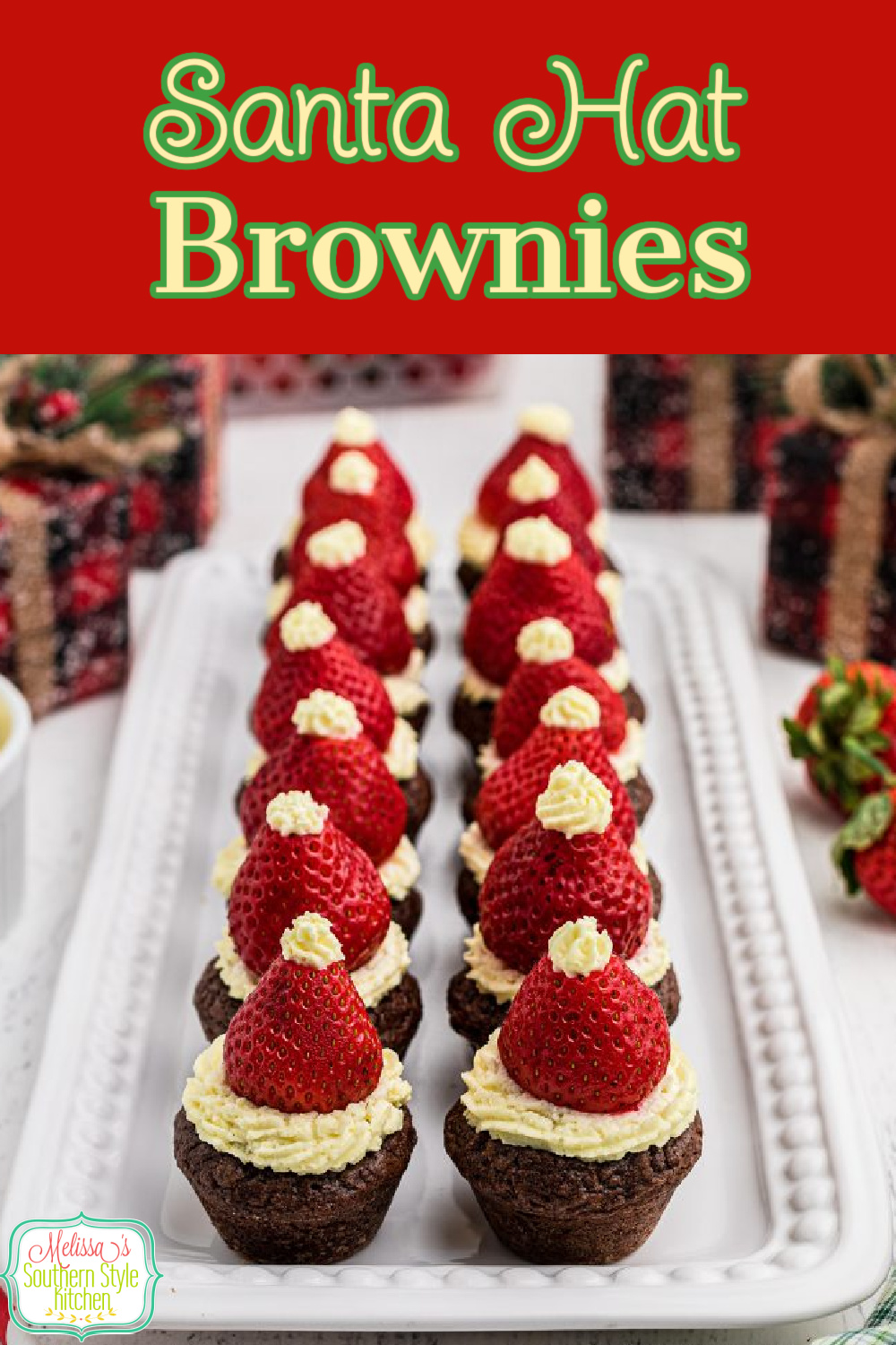 These cute as a button Santa Hat Brownies are a whimsical two bite dessert that will be the talk of your holiday goodies #santahatbrownies #santa #santahats #browniebites #brownies #christmasdesserts #christmasrecipes #strawberries