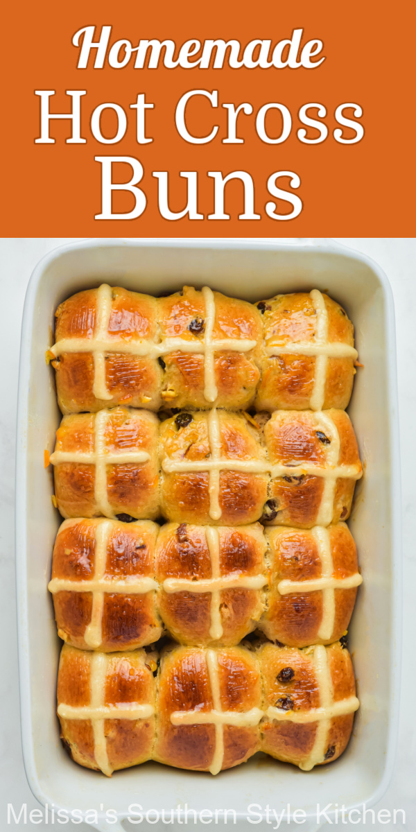 These homemade Hot Cross Buns feature a scratch made yeast dough that's filled with sweet raisins and candied orange peel area must-make for Easter #hotcrossbuns #hotcrossbunsrecipe #easterrecipes #easterbrunch #breakfast #candiedorangepeel #besteasterrecipes #easterbreakfastrecipes