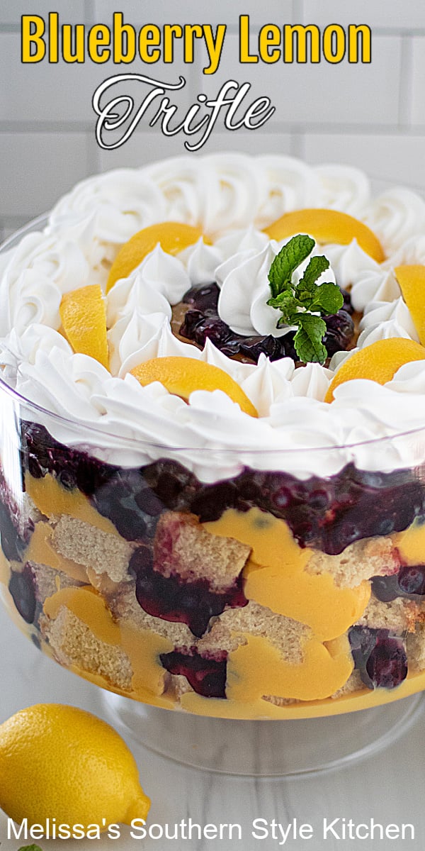 This stunning Blueberry Lemon Trifle recipe is an edible centerpiece guaranteed to add height and beauty to the dessert table #blueberrylemontrifle #lemontriflerecipe #bestlemontriflerecipe #blueberries #lemondesserts #poundcaketrifle