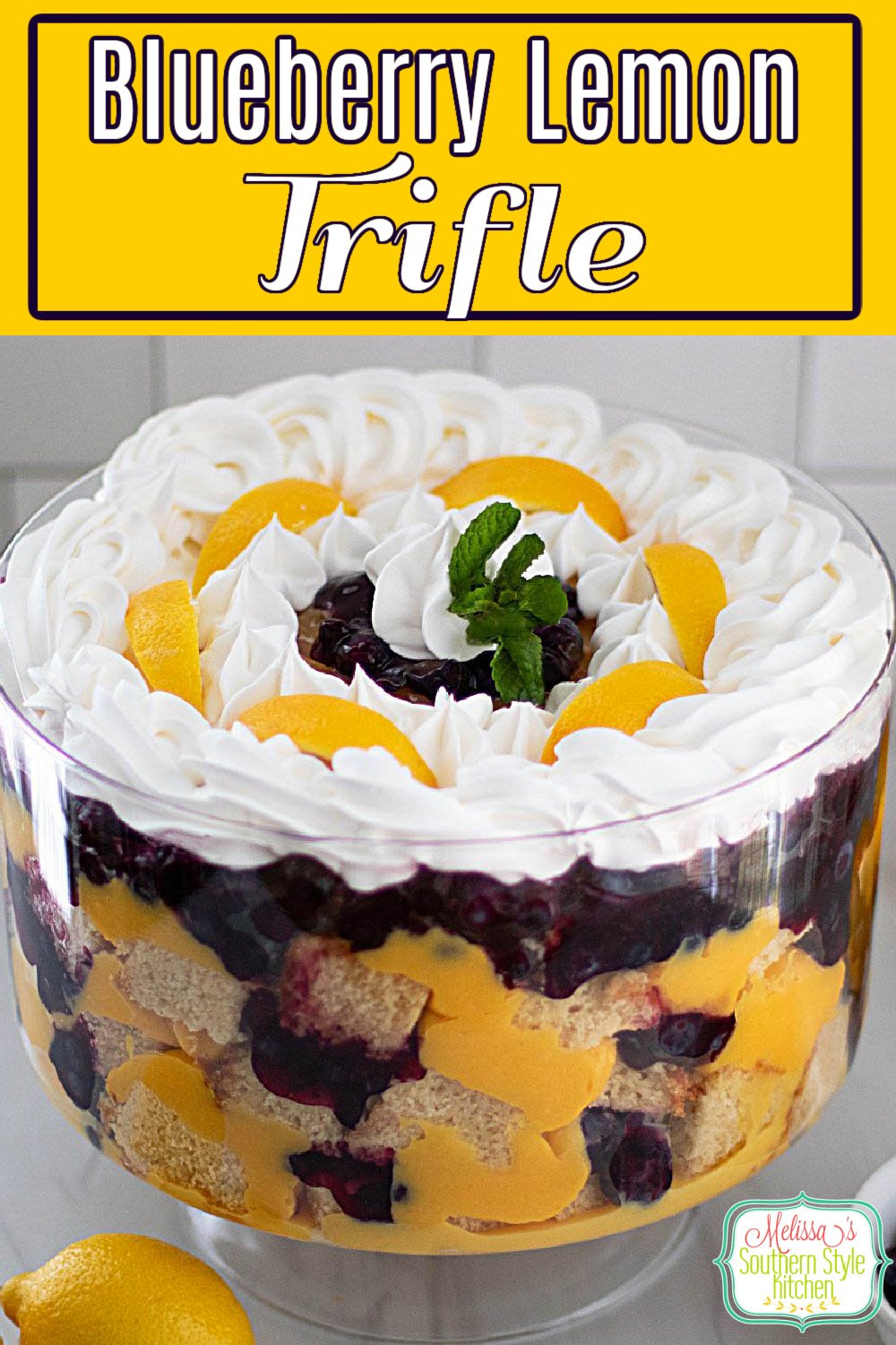 This stunning Blueberry Lemon Trifle recipe is an edible centerpiece guaranteed to add height and beauty to the dessert table #blueberrylemontrifle #lemontriflerecipe #bestlemontriflerecipe #blueberries #lemondesserts #poundcaketrifle via @melissasssk