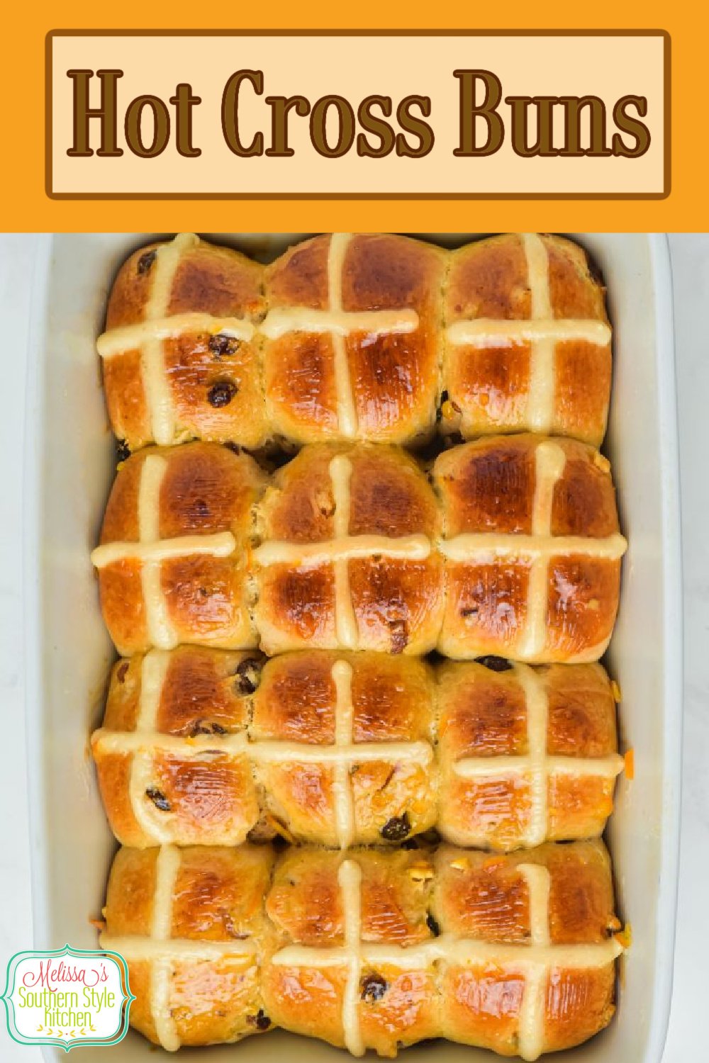 These homemade Hot Cross Buns feature a scratch made yeast dough that's filled with sweet raisins and candied orange peel area must-make for Easter #hotcrossbuns #hotcrossbunsrecipe #easterrecipes #easterbrunch #breakfast #candiedorangepeel #besteasterrecipes #easterbreakfastrecipes