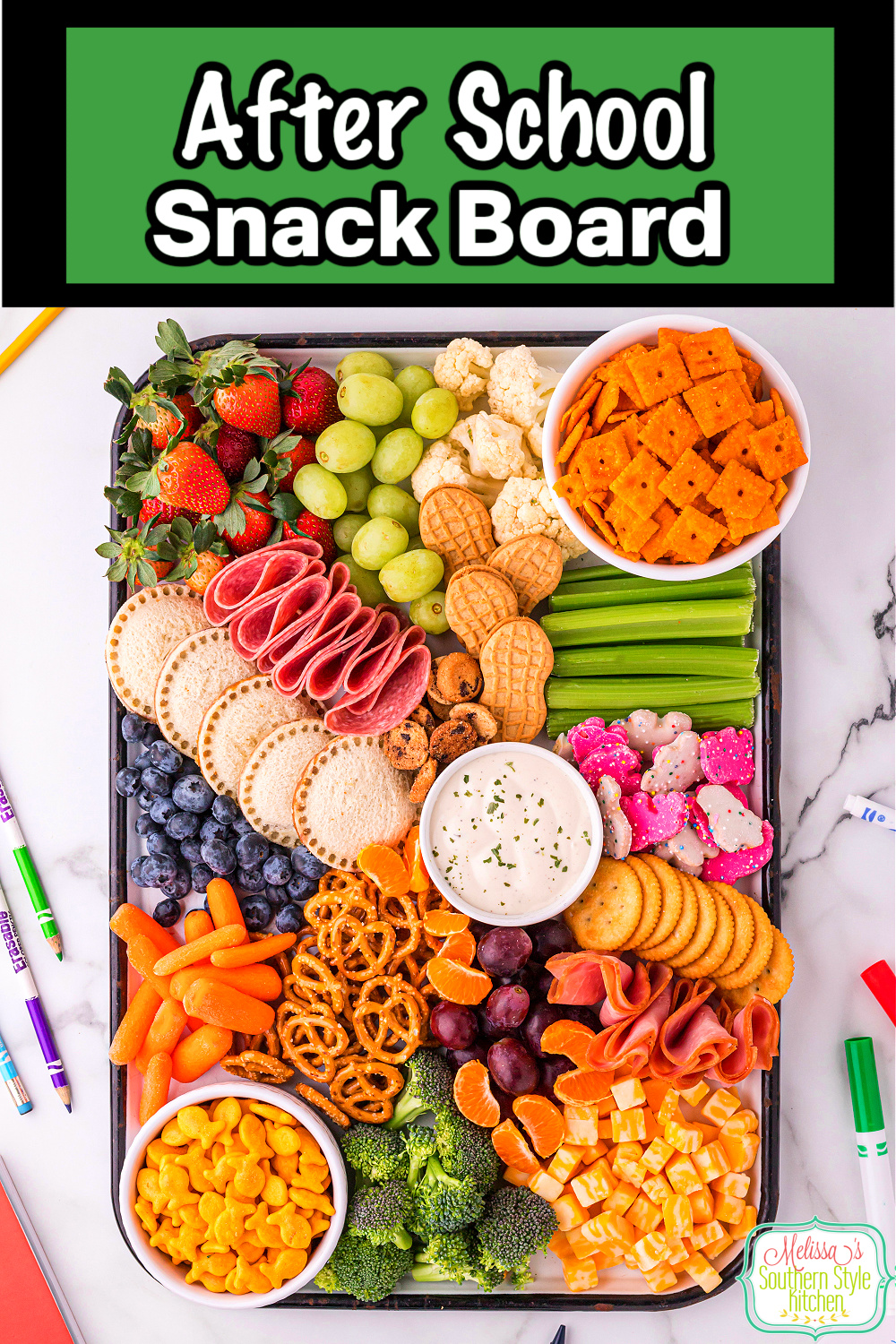 Looking for a way to get the kids to eat more fruits and vegetables? Create an After School Snack Board filled with all the good snacks! #snackboard #afterschoolsnacks #easysnackrecipes #uncrustables #easyrecipes #charcuterieideas #snacks #PB&Jsandwiches #ranchdip #charcuterie via @melissasssk