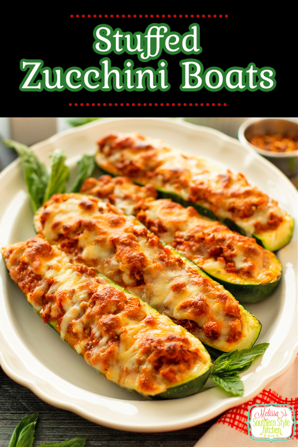 These Italian sausage Stuffed Zucchini Boats are a delicious way to serve whole fresh zucchini as an entrée #stuffedzucchini #stuffedzucchiniboats #Italiazucchini #bakedzucchini #lowcarbzucchinirecipes #ketozucchinirecipes #bestzucchiniboatsrecipe