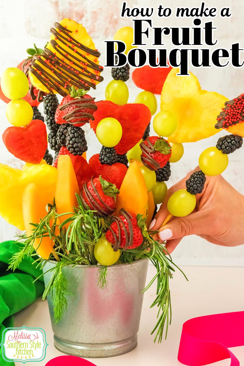 Share this Fruit Bouquet with the special people in your lives #fruitbouquet #howtomakeafruitbouquet #bestfruitbouquets #Valentinedaydesserts #valentinesdaygifts #freshfruit #fruit #fruitrecipes #dessert #dessertrecipes #homemadegifts via @melissasssk