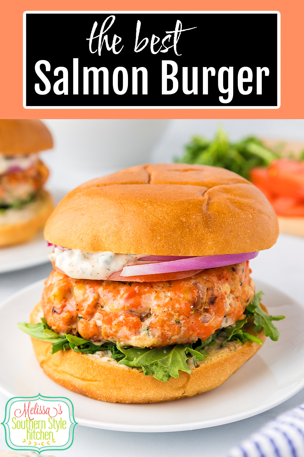 Upgrade your burger menu with this Salmon Burger recipe served on toasted buns with fresh toppings and drizzled with a remoulade sauce. #salmonrecipes #salmonburgers #easyburgerrecipes #grilledsalmon #freshsalmonrecipes via @melissasssk
