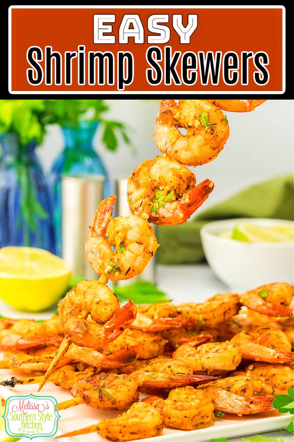 These garlic butter basted Shrimp Skewers feature a homemade Cajun seasoning blend that's packed with flavor. #shrimpskewers #shrimprecipes #easyshrimprecipes #cajunshrimp #cajunseasoning #bakedshrimp #shrimpkabobs